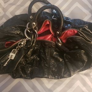 Express black faux patent leather satchel